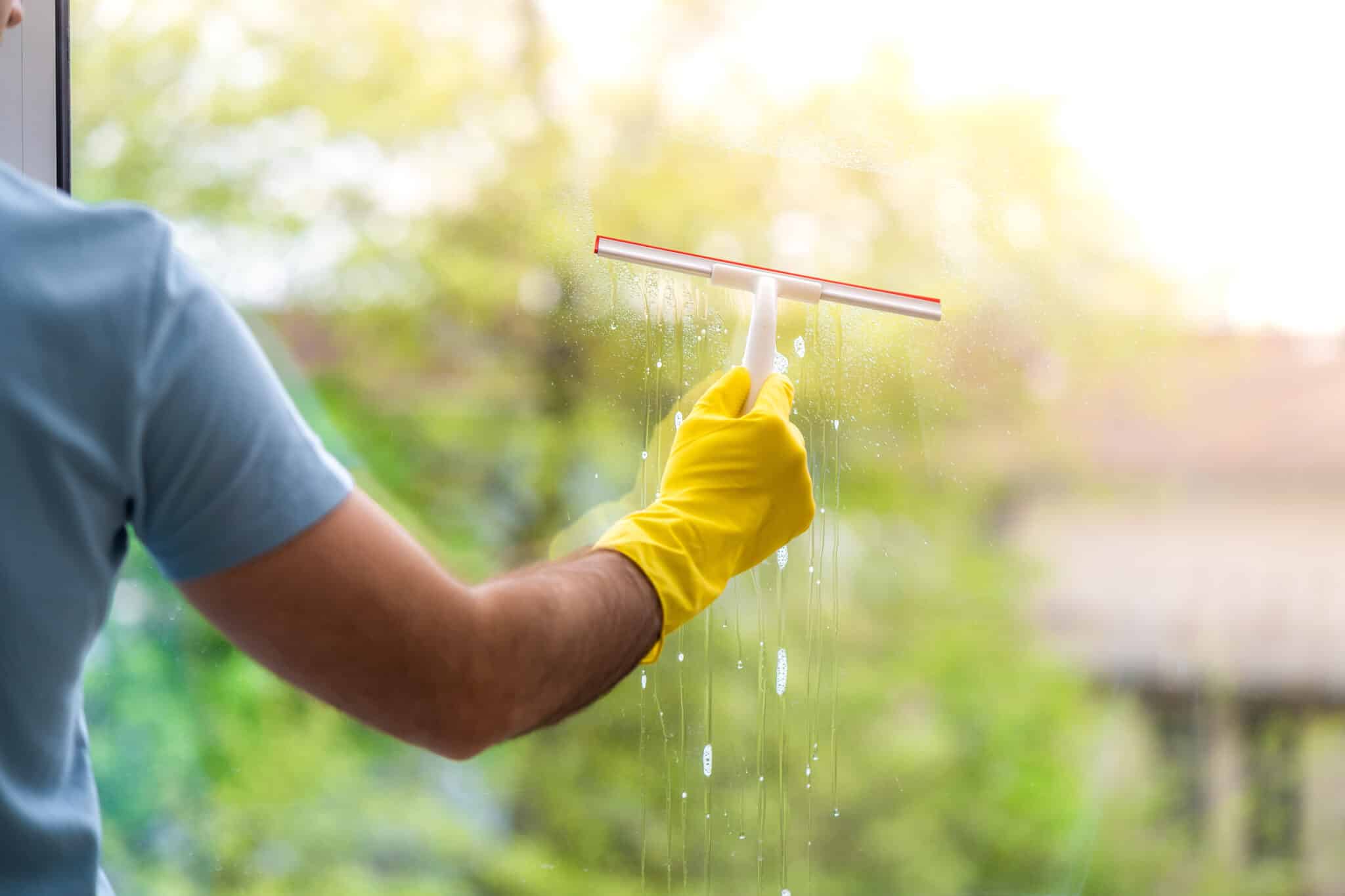 view through a window being cleaned