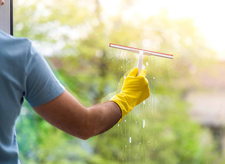 view through a window being cleaned